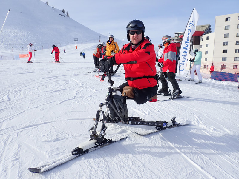  A member of BLESMA (the United Kingdom's Charity for Limbless Veterans) poses with the iSkibike in La Plagne, Switzerland, in the European Alps.
